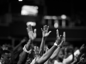 Women's hands raised