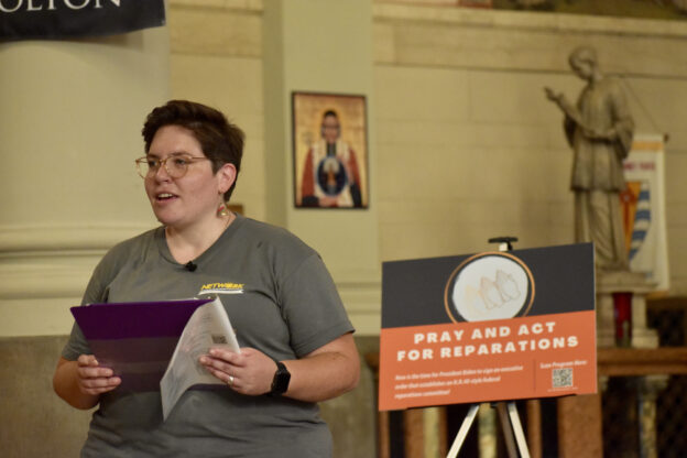 Sr. Eilis McCulloh, HM, speaks at a reparations vigil in Cleveland in June 2022.
