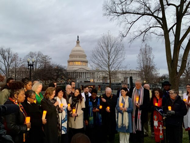 Mary Novak, NETWORK Executive Director, speaks at a sunrise vigil of interfaith leaders marking the second anniversary of the Jan. 6 insurrection. Photo by Colleen Ross