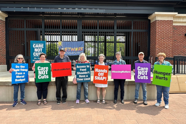 Erie, PA NETWORK Advocates Team members Cynthia Legin-Bucell (far left), Mary Nelson (fourth from right), and Michael Bucell (second from right)