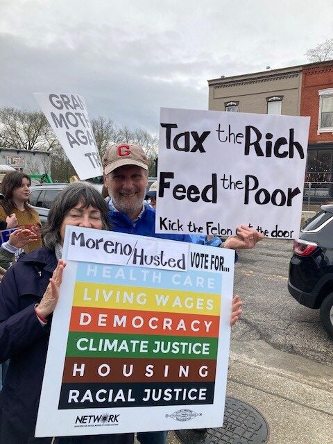 Krista and Ed Zivkovich participate at an Ohio Hands Off rally in April.